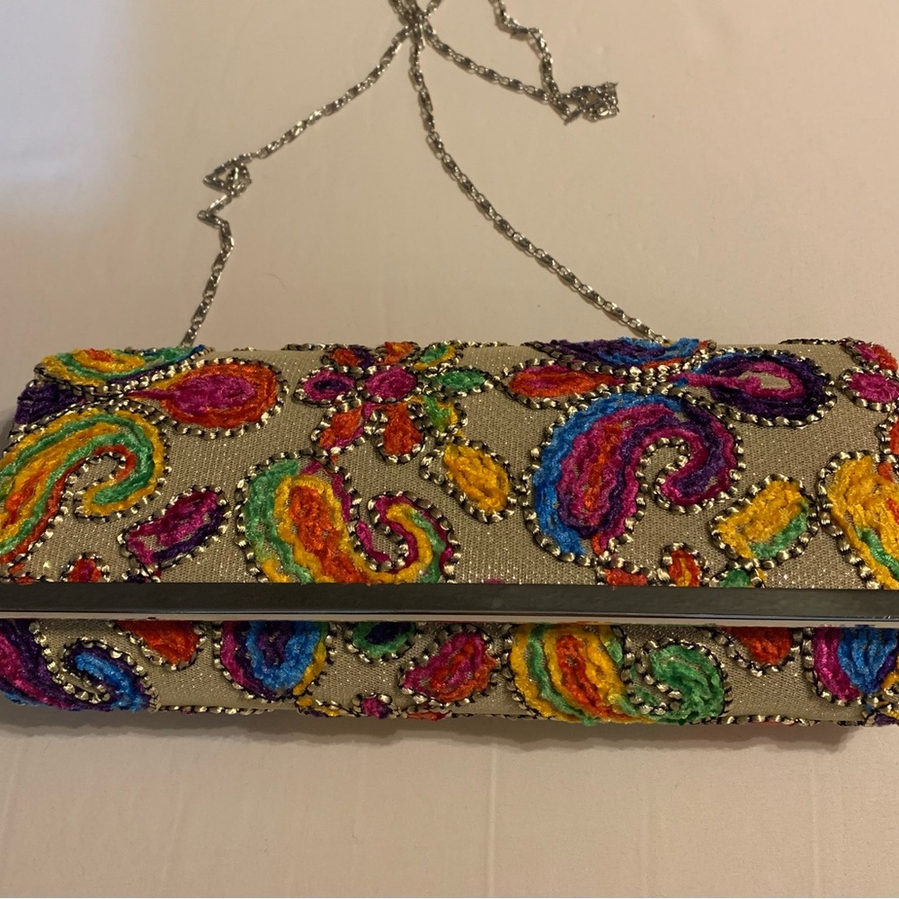 New multicolor, paisley, print embellished clutch.